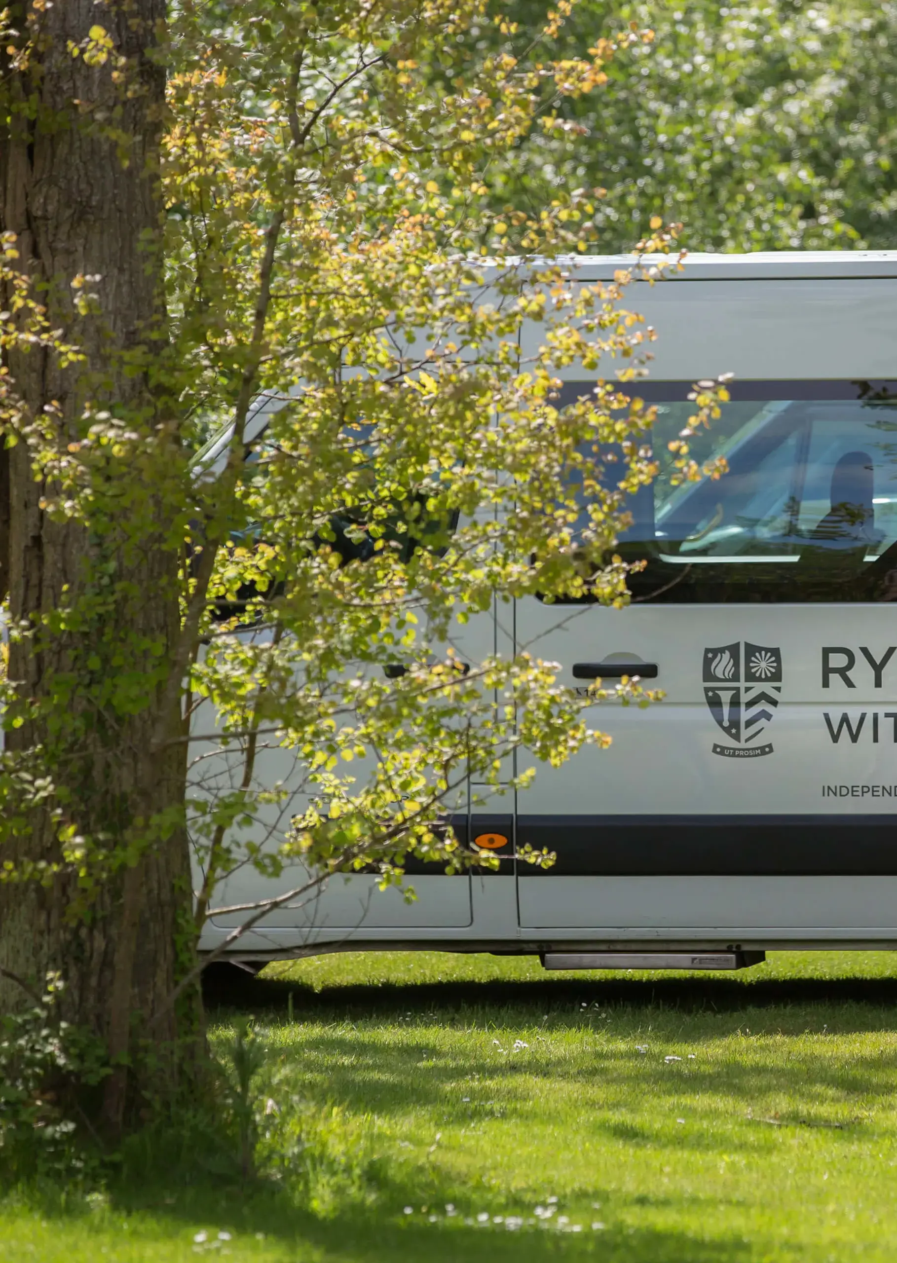 Ryde School mini bus with Ryde School branding