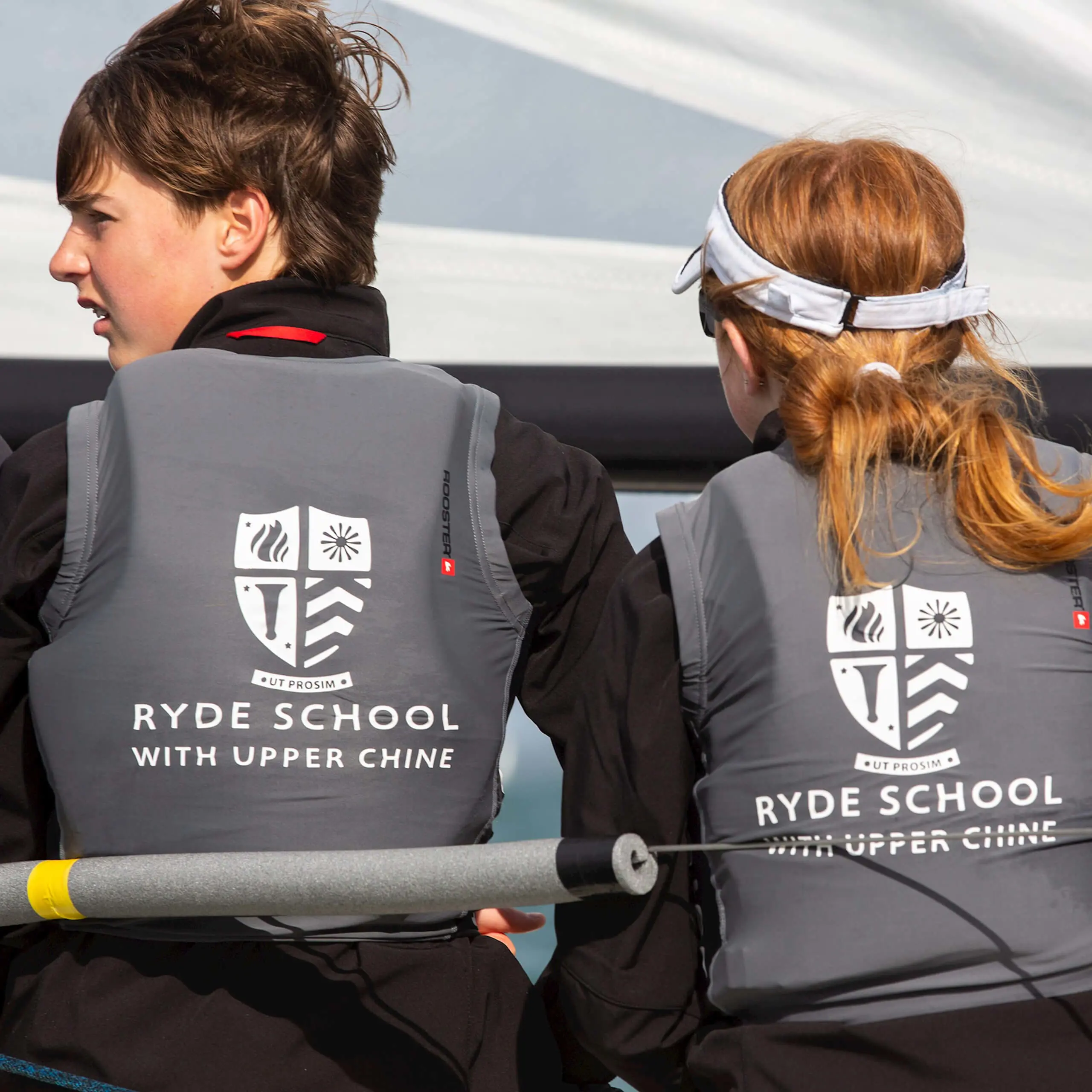 Ryde School Senior Pupils sailing on the Solent wearing Ryde School branded life jackets