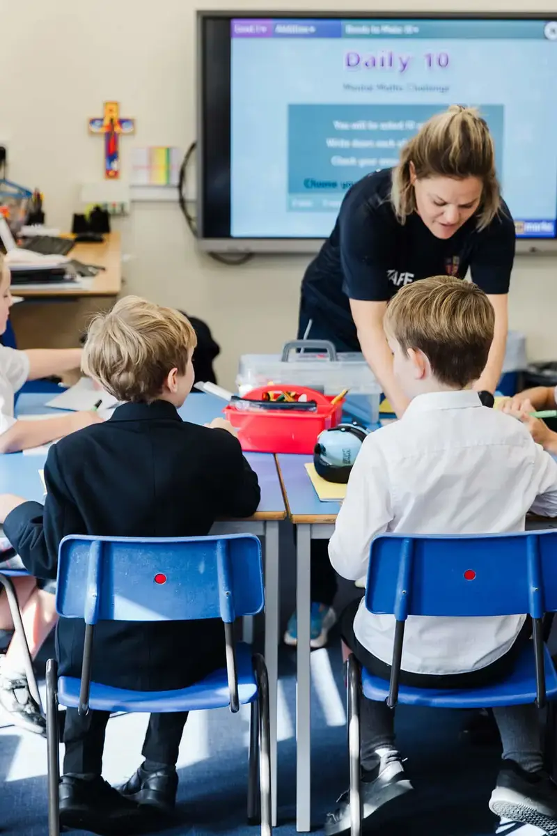 Teacher in class with pupils