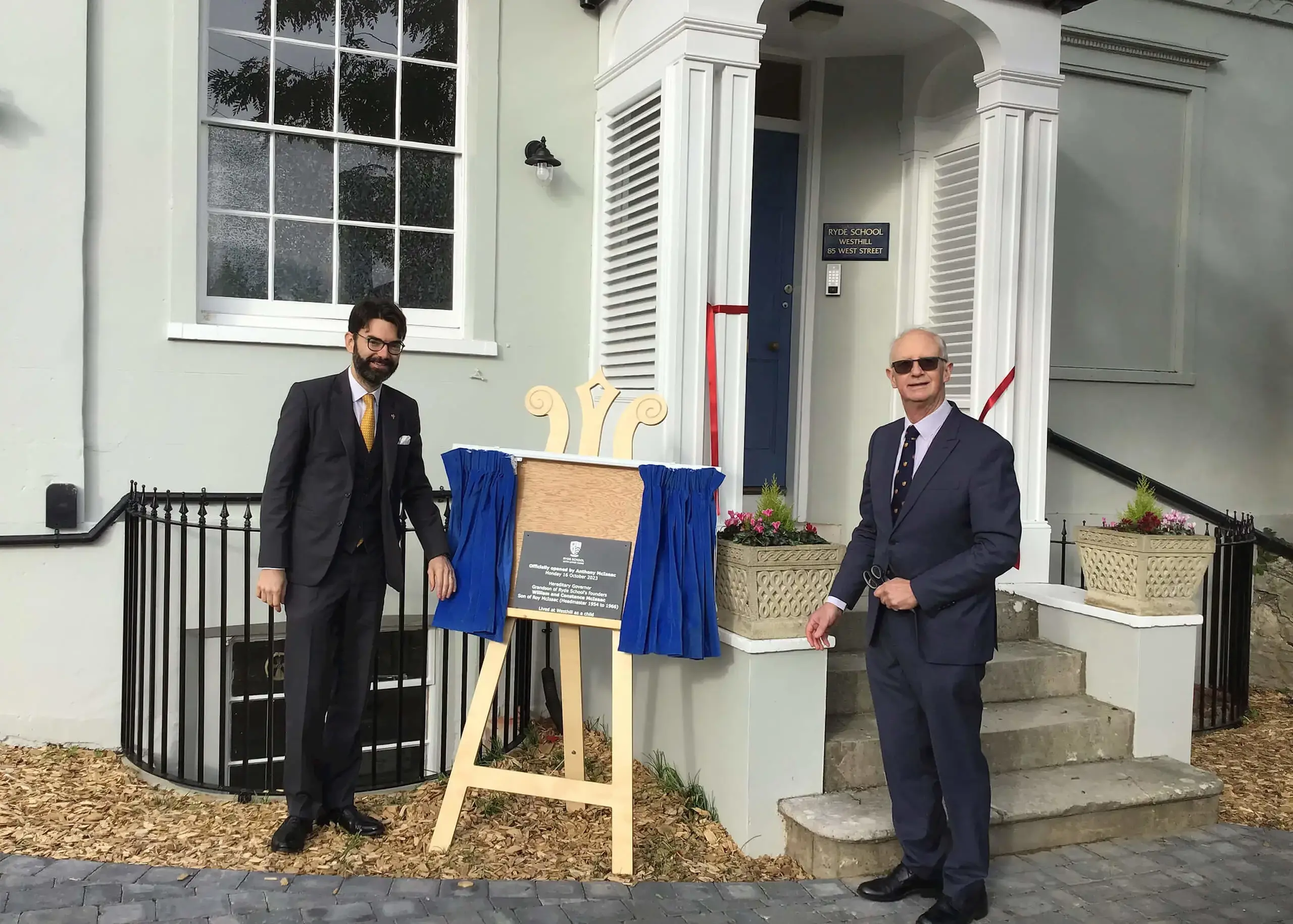 Mr Anthony McIsaac cutting the ribbon and unveiling the plaque at official Westhill Nursery Opening