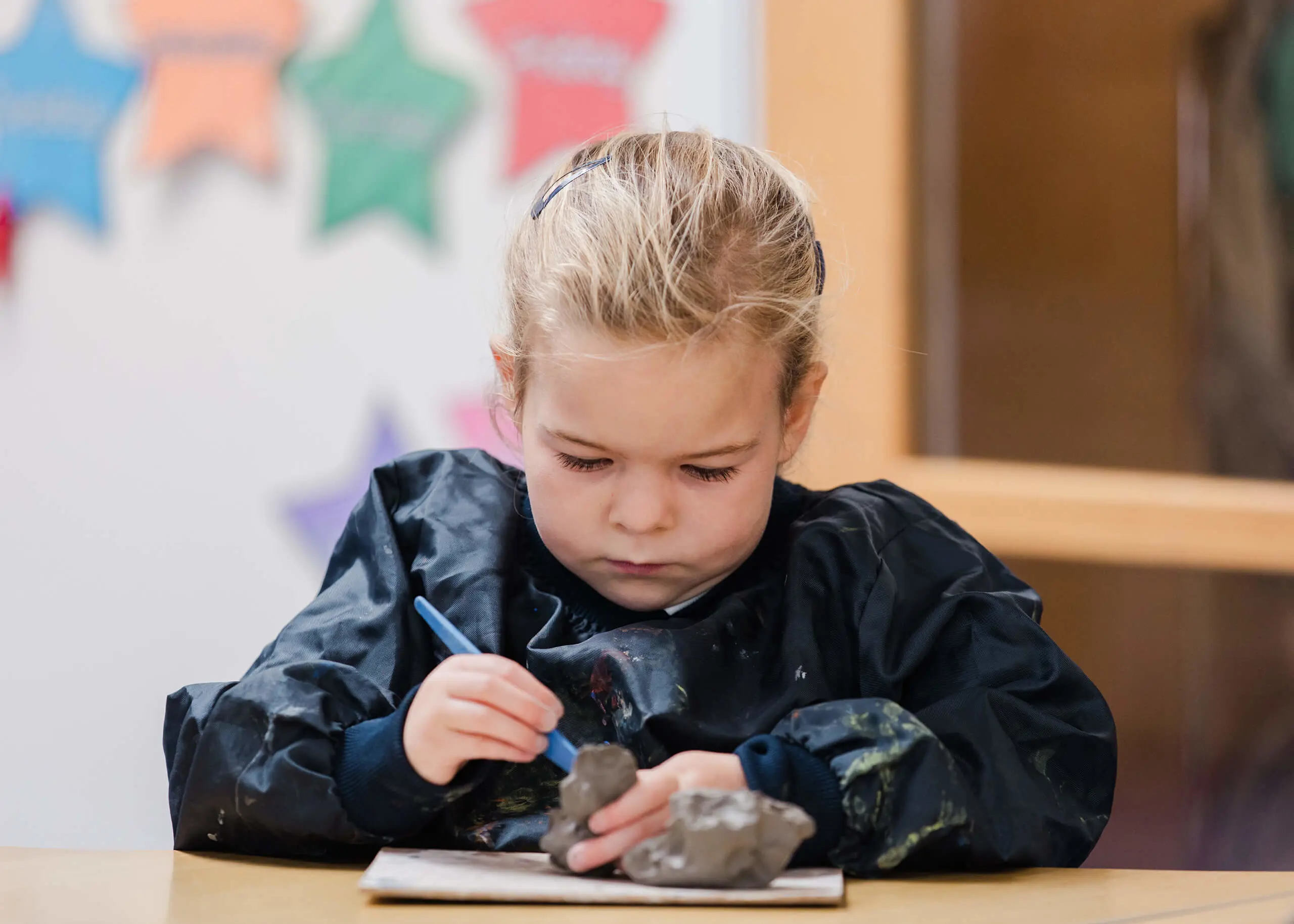 Video Placeholder Image - Ryde School Pre-Prep pupil creating with clay