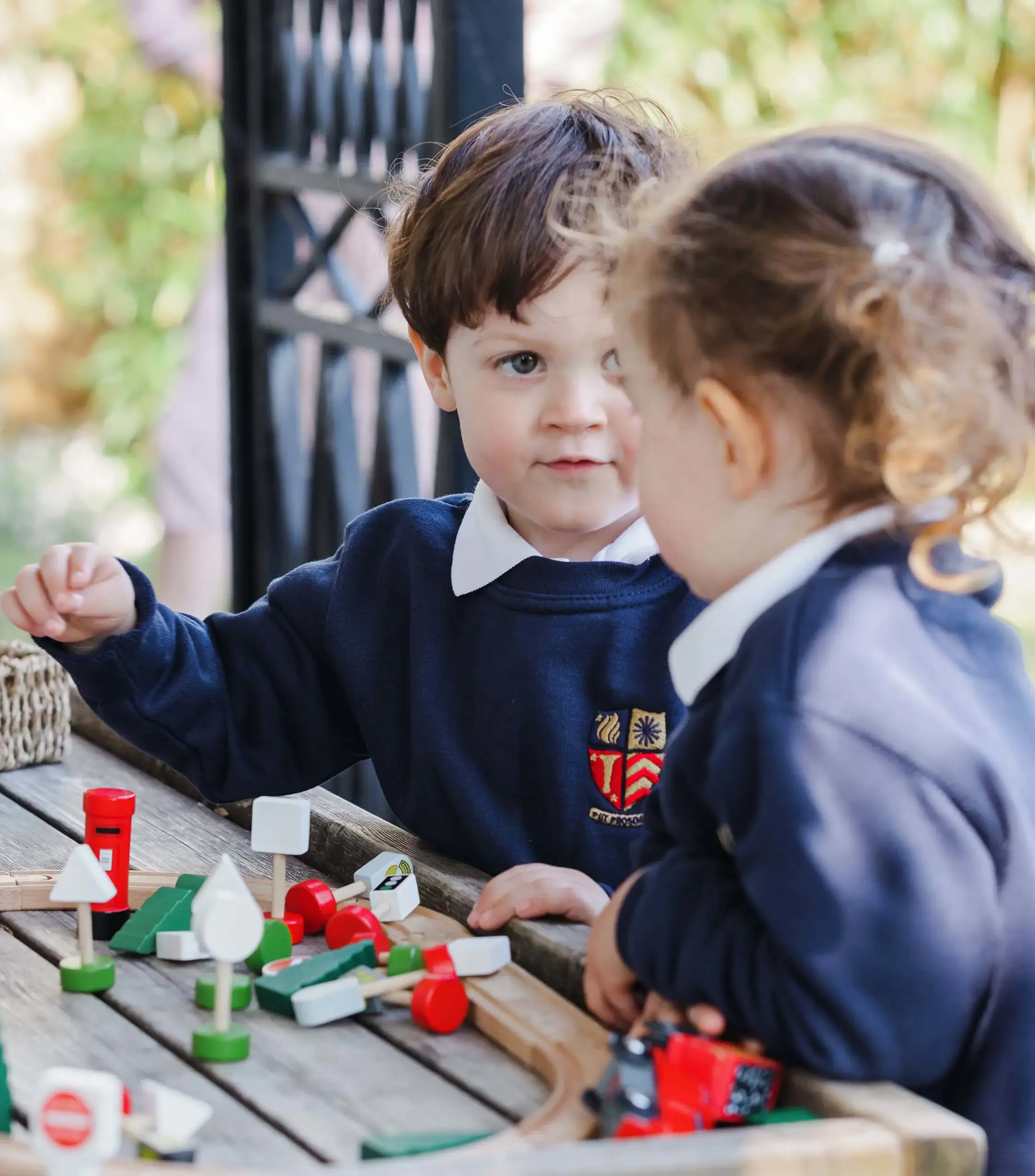 Ryde School Nursery pupils playing with trains